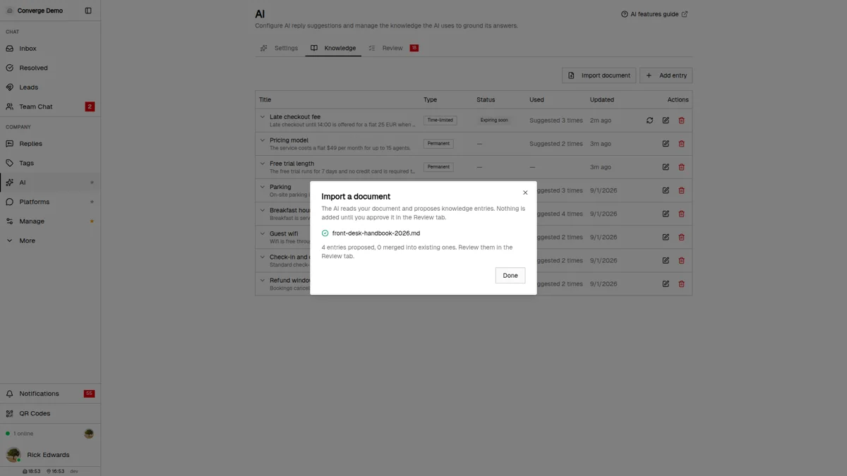 The Import a document dialog after a finished import of a staff handbook, reporting four entries proposed and none merged into existing ones, with a prompt to review them in the Review tab